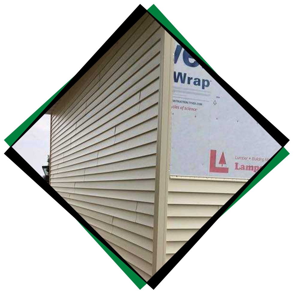 Yellowish vinyl siding being installed by Northwood Builders